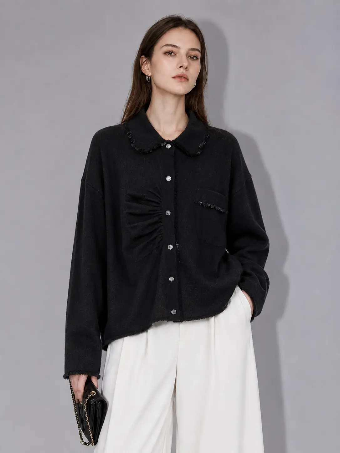 minimalist black knit cardigan shirt front image